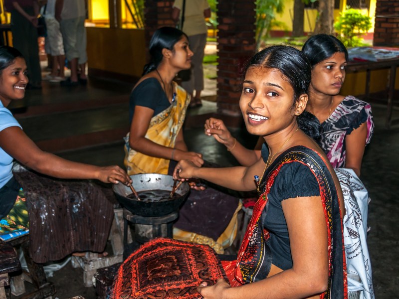 Woman sewing traditional crafts