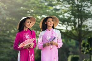 Two Vietnamese women smiling